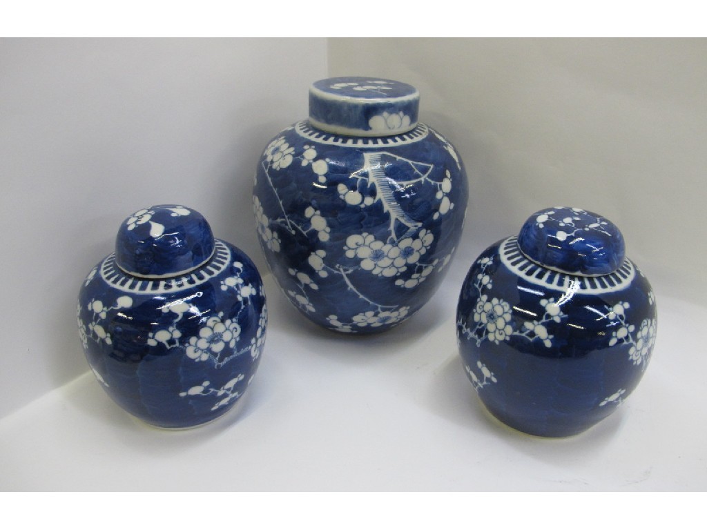 Appraisal: Three Chinese blue and white prunus decorated ginger jars