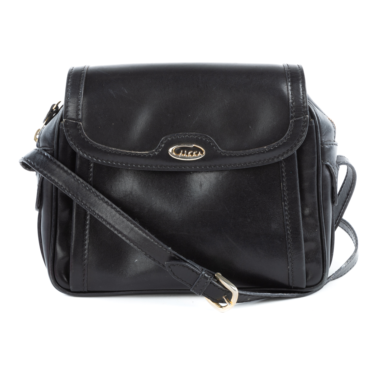 Appraisal: A GUCCI FLAP CROSSBODY A black leather Gucci Flap Crossbody