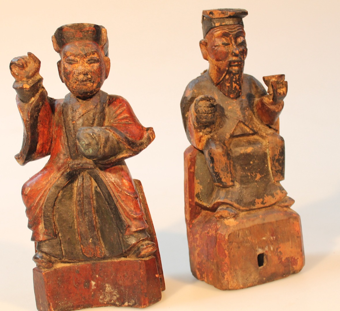 Appraisal: Two similar Chinese hardwood figures each of sages in flowing