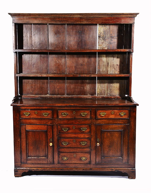 Appraisal: A TH CENTURY OAK DRESSER with two shelf plate rack