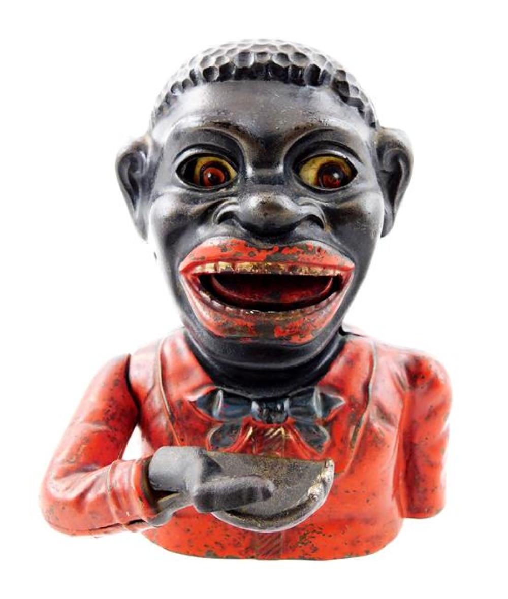 Appraisal: BLACK AMERICANA Jolly Nigger Bank cast iron mechanical bank c