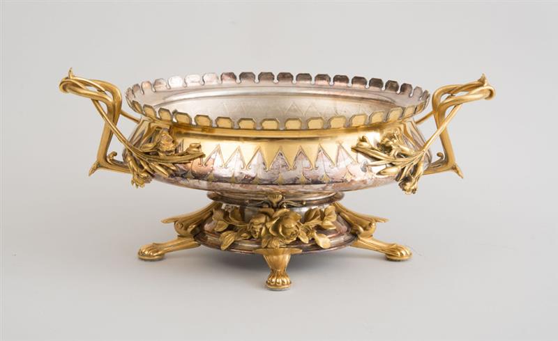 Appraisal: CONTINENTAL SILVERED AND GILT-METAL TWO-HANDLED OVAL CENTERPIECE x in Property