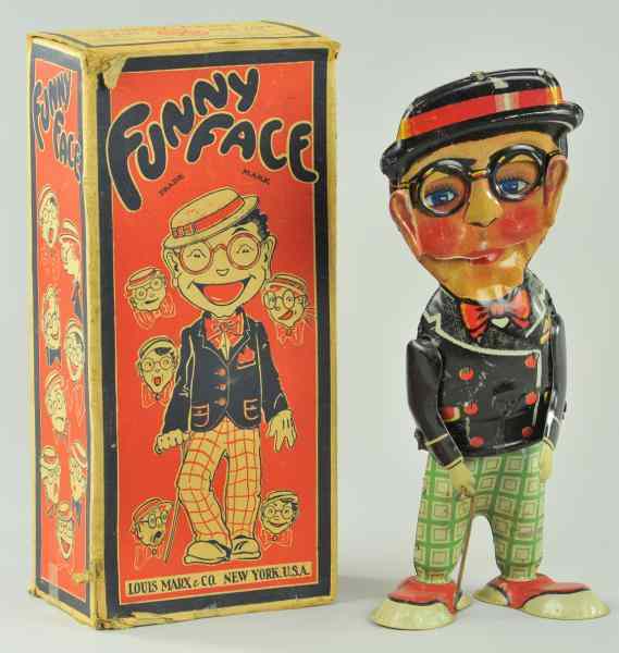 Appraisal: MARX FUNNY FACE Boxed example lithographed tin tall Harold Lloyd