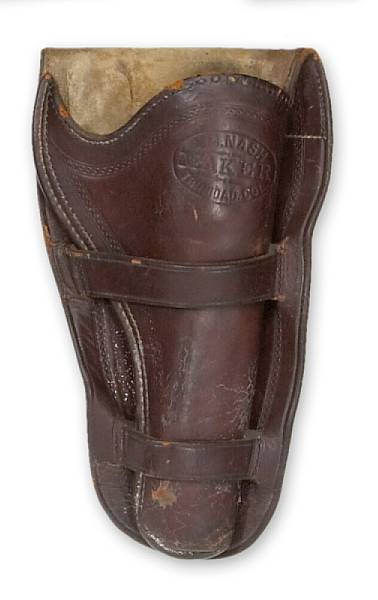 Appraisal: A scarce double loop holster by A M Nash Lined