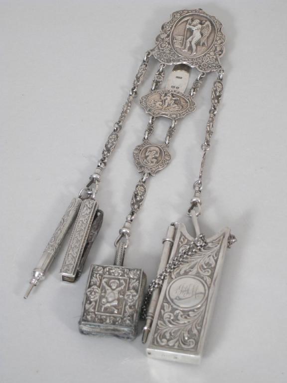 Appraisal: A Victorian silver Chatelaine cast with reaper Neptune and Atlas