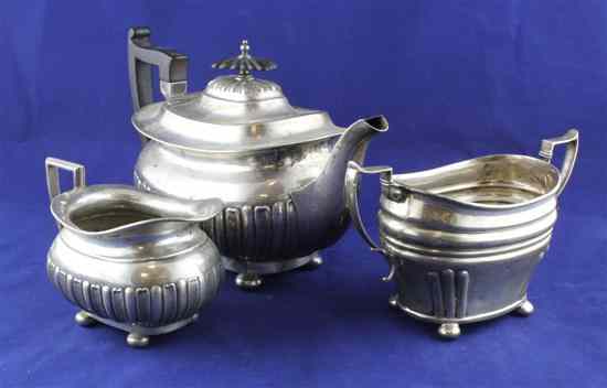 Appraisal: A late Victorian demi fluted silver teapot and cream jug