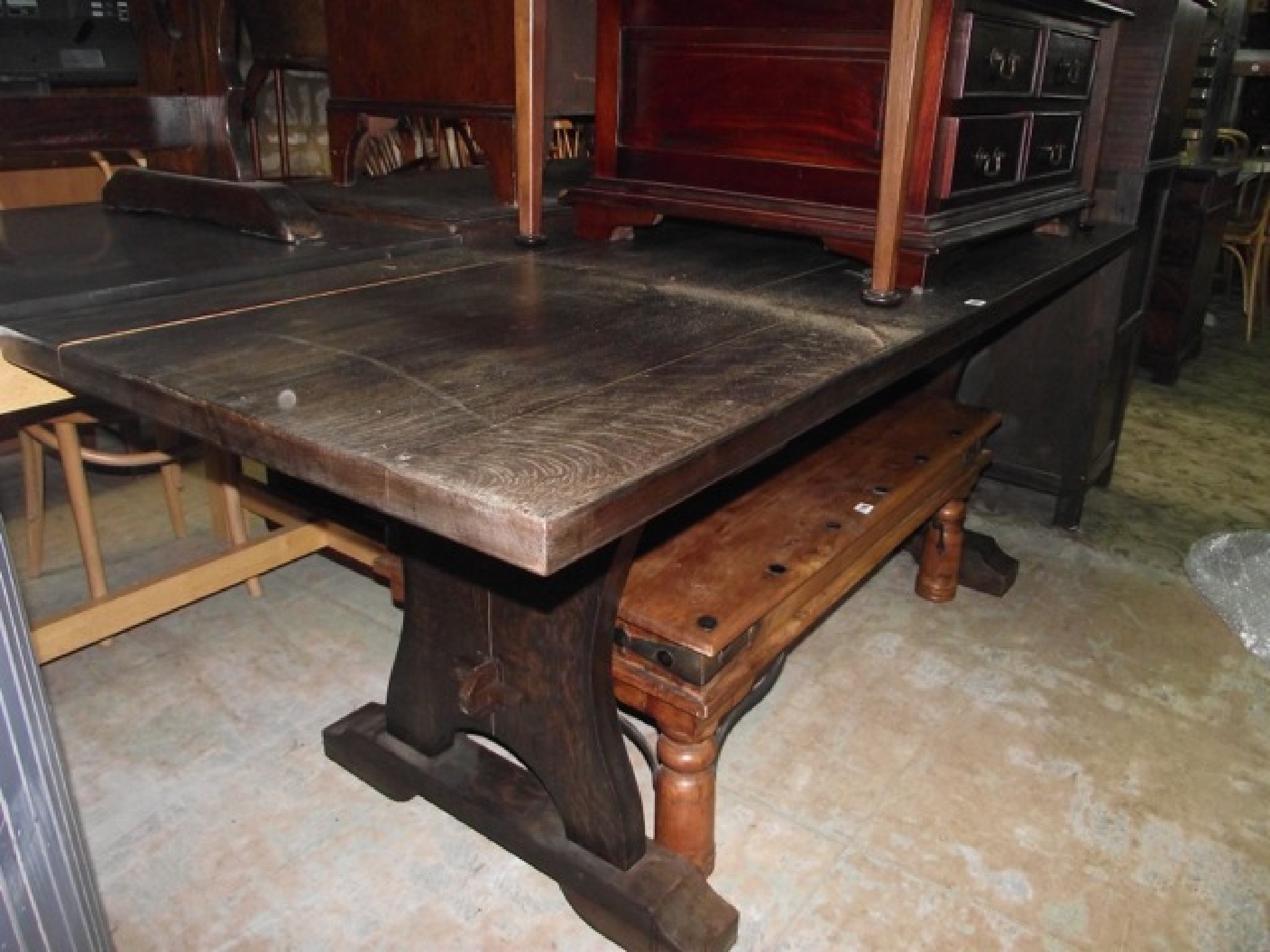 Appraisal: An oak refectory table the rectangular top raised on a