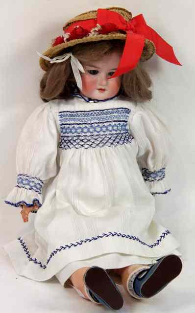 Appraisal: An Armand and Marseille bisque headed doll made in Germany