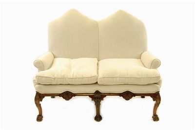 Appraisal: An th century style two seater settee upholstered cream linen