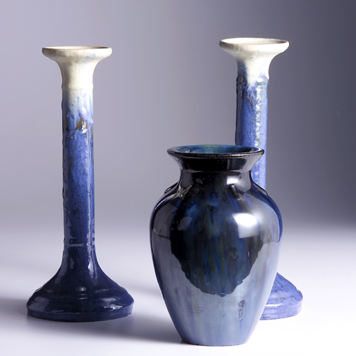 Appraisal: FULPER Three pieces a pair of tall candlesticks in mottled