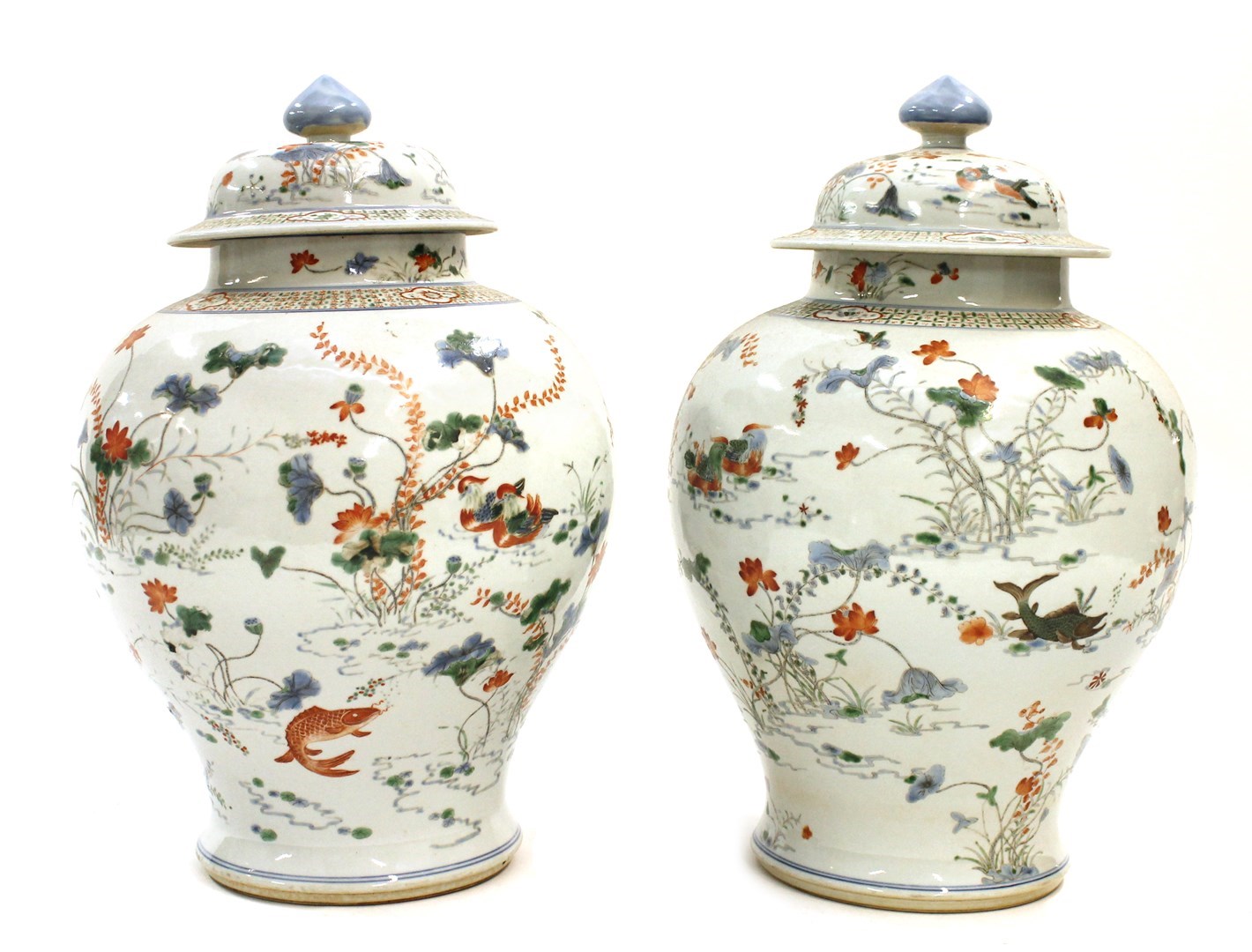 Appraisal: A pair of Chinese famille-verte baluster vases and covers late