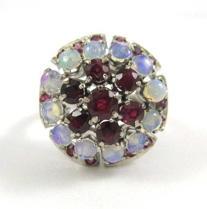 Appraisal: RUBY OPAL AND EIGHTEEN KARAT WHITE GOLD RING The white