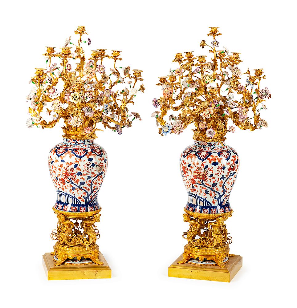 Appraisal: A Pair of Monumental Gilt Bronze Mounted Imari Porcelain Candelabra