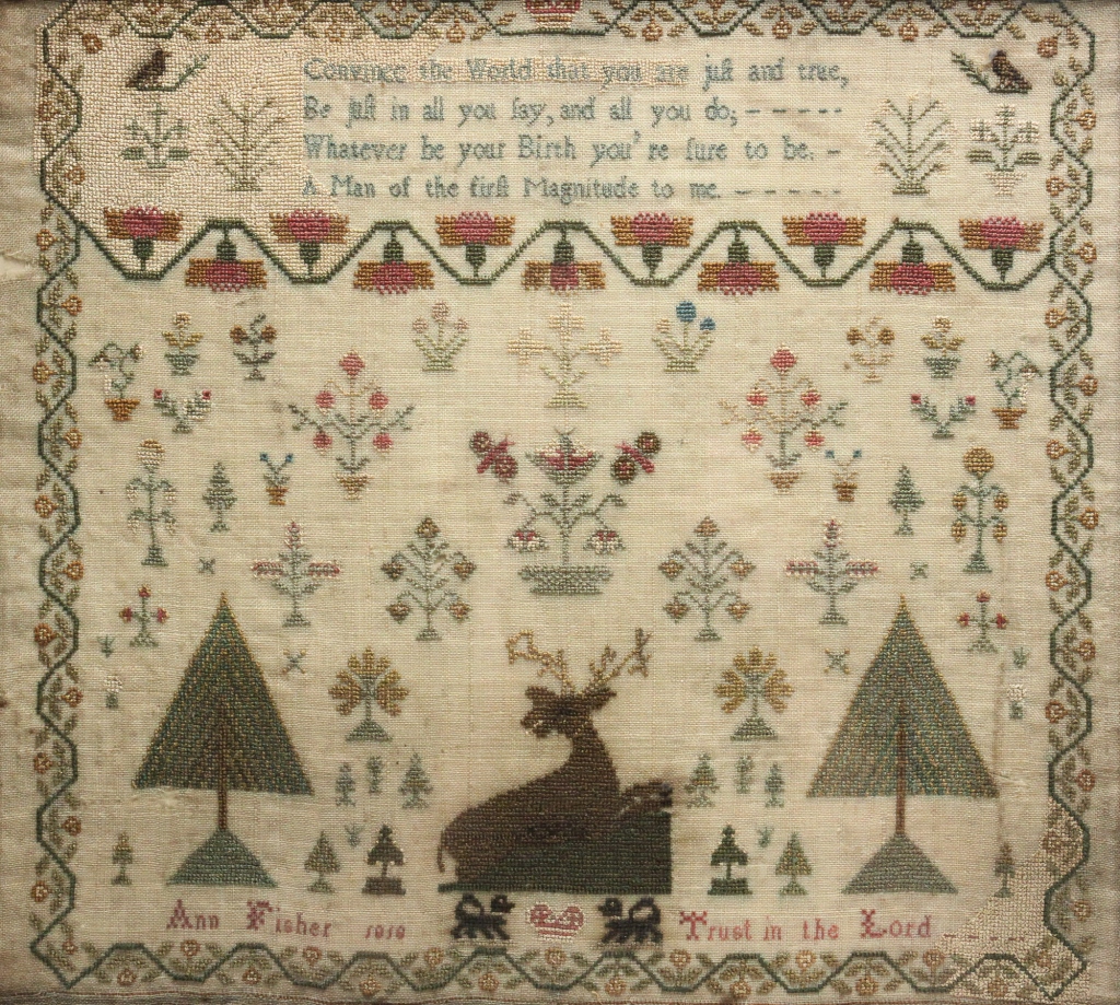 Appraisal: American or English silk on linen Finely stitched verse flowers