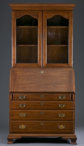 Appraisal: Henkel Harris Secretary Cherry Stepped cornice over glass shaped cabinet