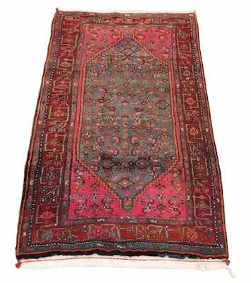 Appraisal: A Bijar Carpet Overall patterned center with vivid pink corner