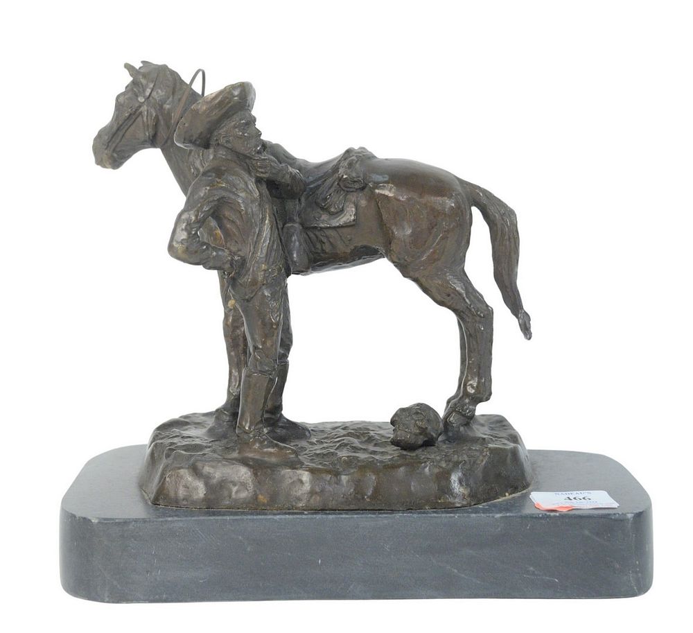 Appraisal: After Frederic Remington American - Untitled cowboy with skull bronze