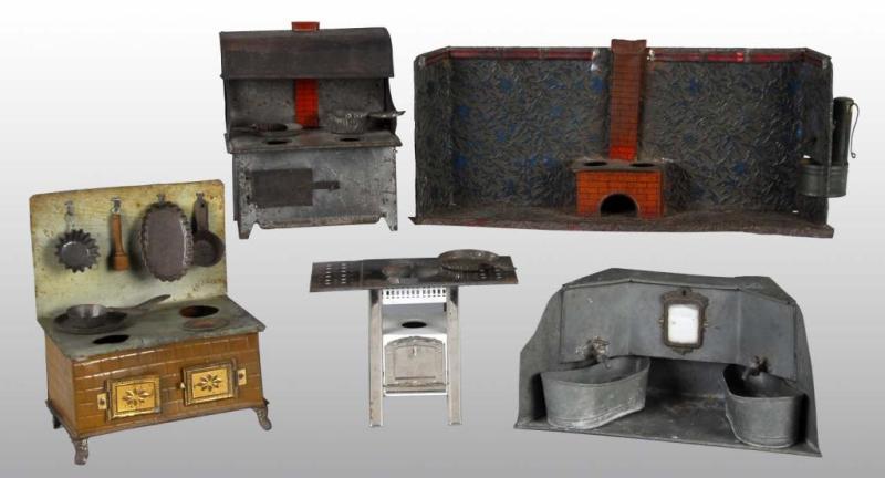 Appraisal: Lot of Tin Child's Stoves Ranges Description Moderate wear to