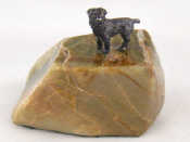 Appraisal: A silver model of terrier standing on a veined hardstone