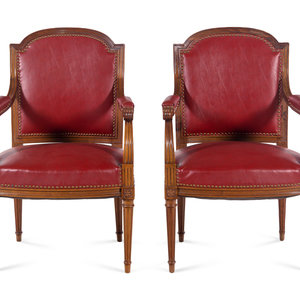 Appraisal: A Pair of Louis XVI Style Walnut Fauteuils th Century