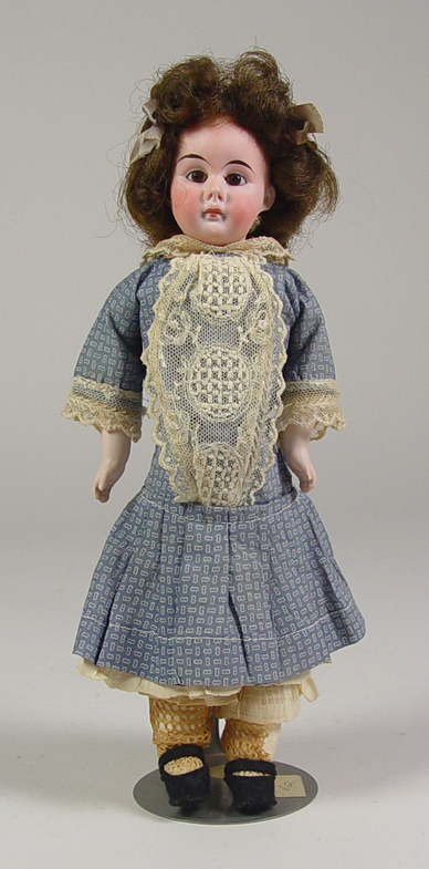 Appraisal: German Character Girl Doll Circa 's German dome shoulderhead girl