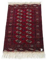 Appraisal: Small Turkmen Rug This carpet features classic turkmen repetitive Tekke