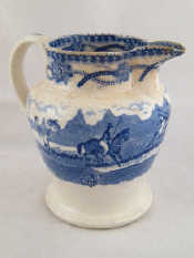 Appraisal: A mid Victorian ceramic jug with transfer blue tiger hunting