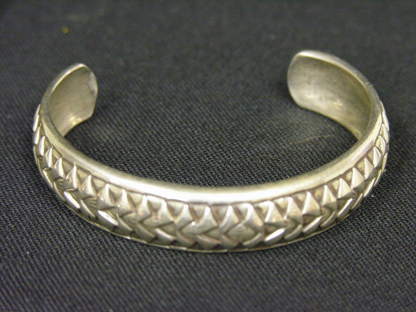 Appraisal: HEAVY STERLING BRACELET Marked sterling Weight Size by