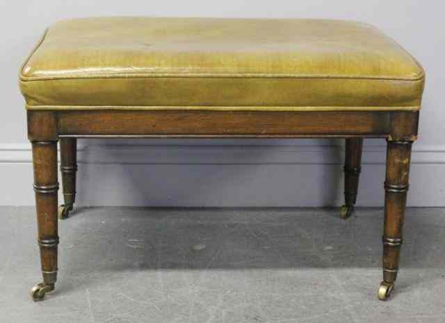 Appraisal: Bamboo Form Ottoman Raised on Brass Wheels From an East