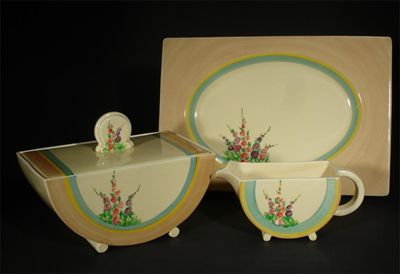 Appraisal: A Clarice Cliff Biarritz part dinner service painted with hollyhock