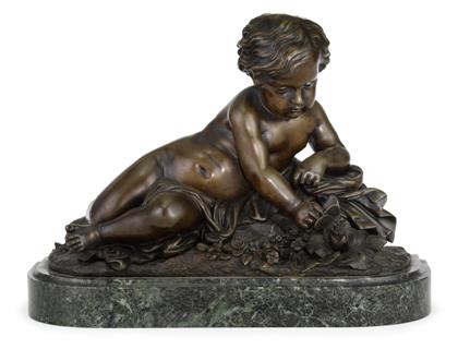 Appraisal: French bronze sculpture of a reclining boy early th century