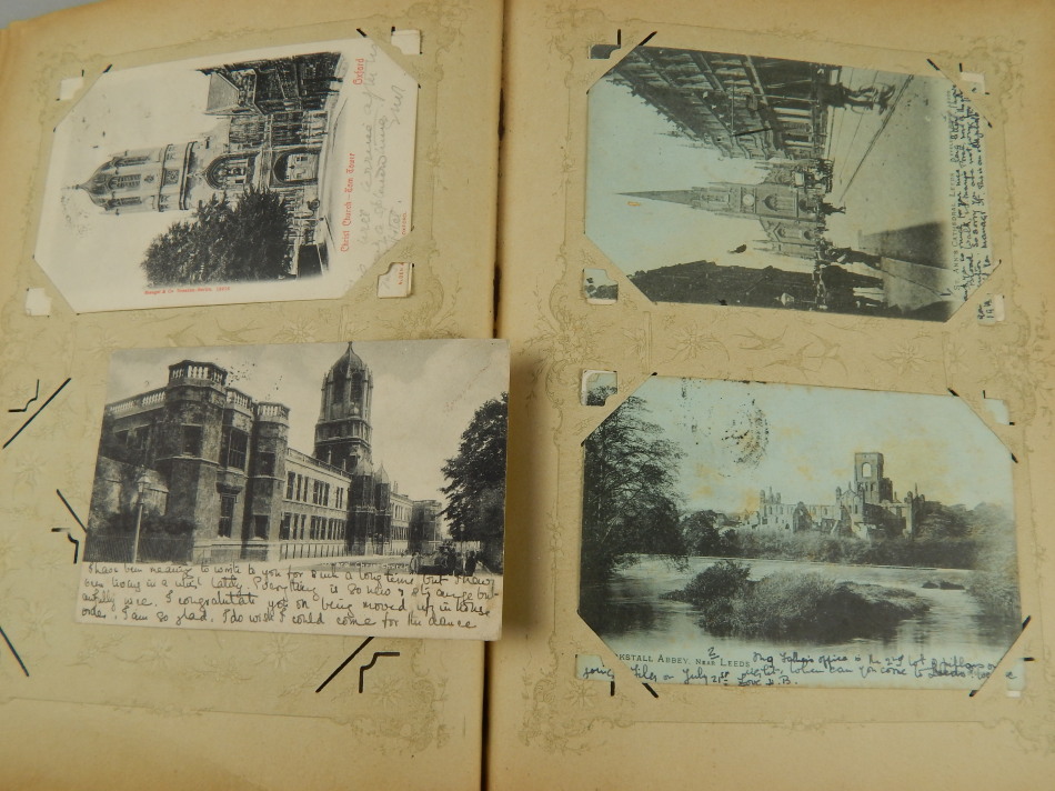 Appraisal: An album containing a number of topographical and other postcards