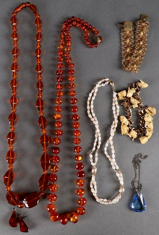 Appraisal: A COLLECTION OF AMBER PEARL AND IVORY JEWELRY A COLLECTION