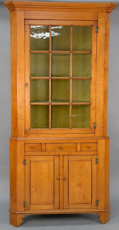 Appraisal: Maple and tiger maple two part corner cupboard height in