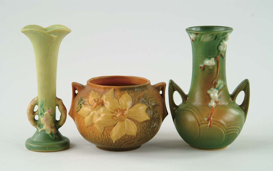 Appraisal: THREE PIECES OF ROSEVILLE POTTERY Roseville Clematis vase is yellow