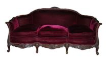 Appraisal: Red Velvet Sofa Sofa has carved wood fame Scalloped bottom