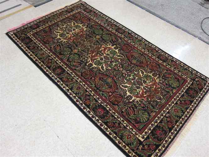 Appraisal: AN ORIENTAL AREA RUG hand woven in the Persian Derghazine