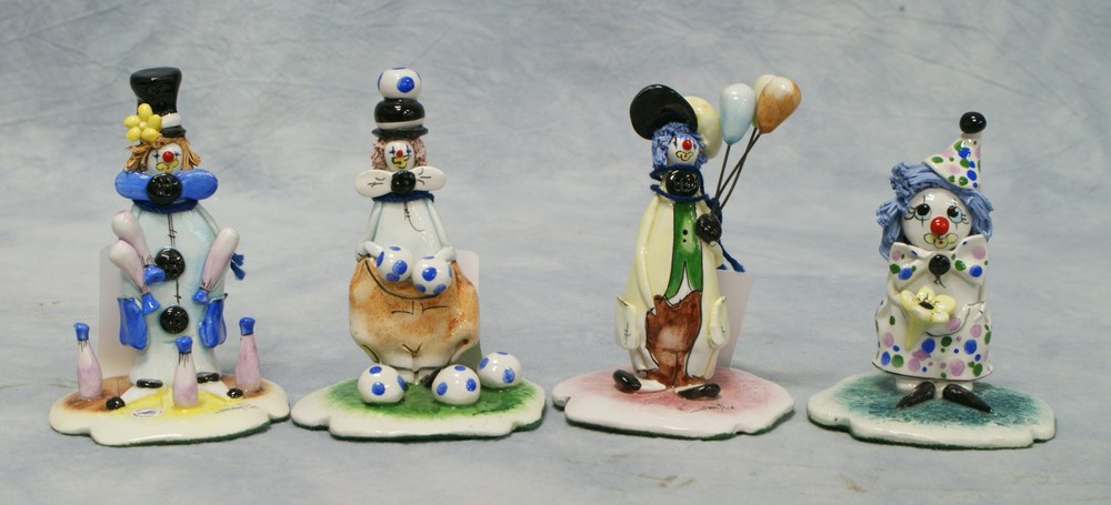 Appraisal: Zanpiva clown figurines pin juggler ball juggler balloon seller clown