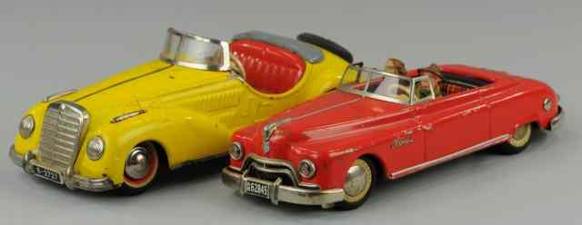 Appraisal: LOT OF TWO AUTOS Includes yellow tin plate Distler sport