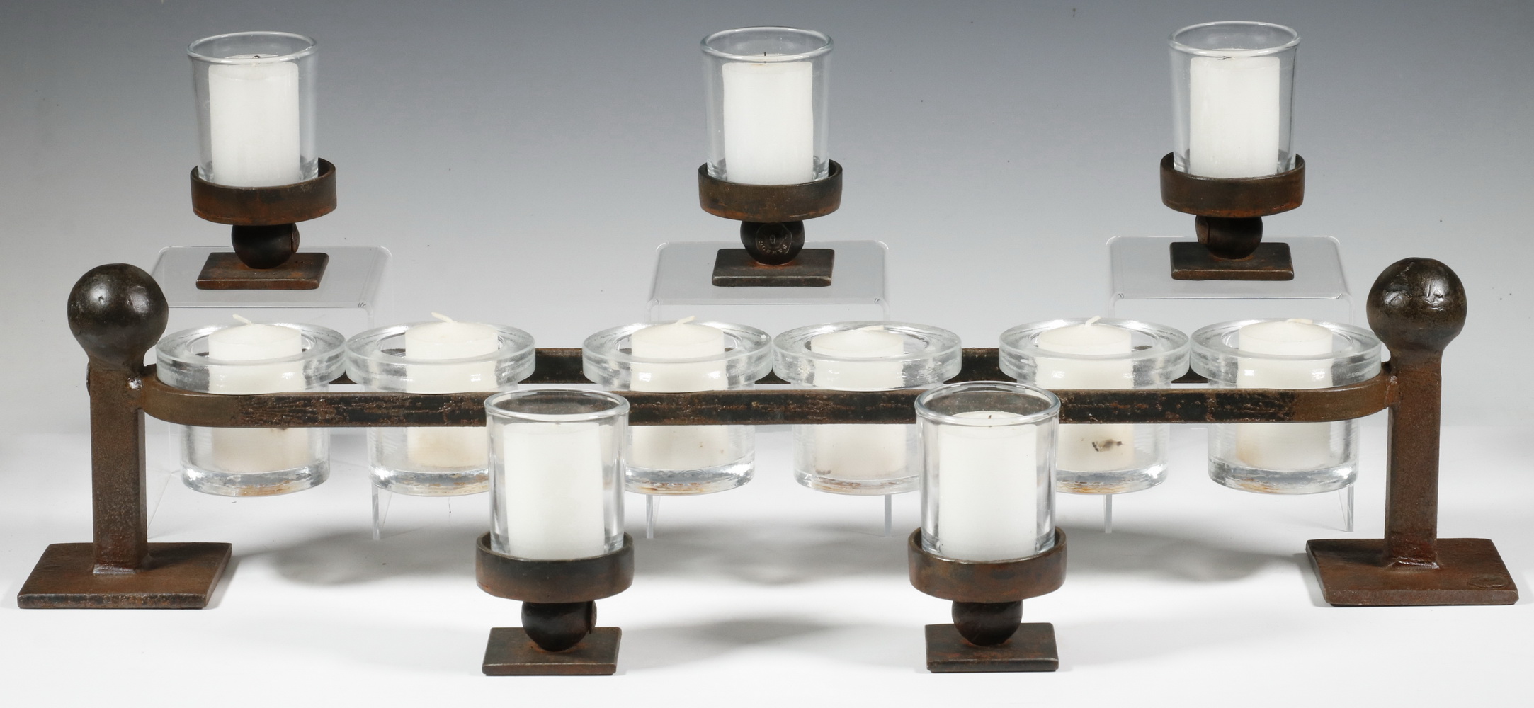 Appraisal: JAN BARBOGLIO IRON VOTIVE CANDLE STANDS PLUS GLASS HOLDERS Lot