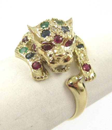 Appraisal: SAPPHIRE RUBY EMERALD AND YELLOW GOLD RING The k gold