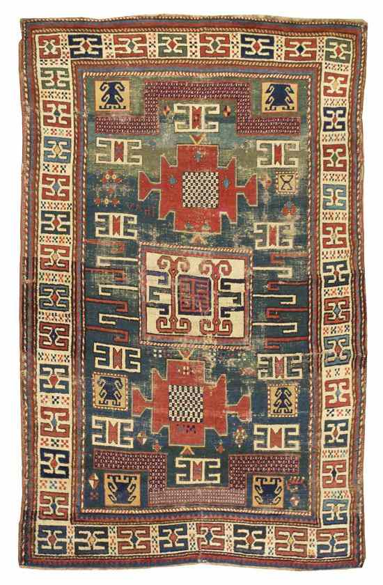 Appraisal: A Kazak Wool Rug having three geometric medallions on a