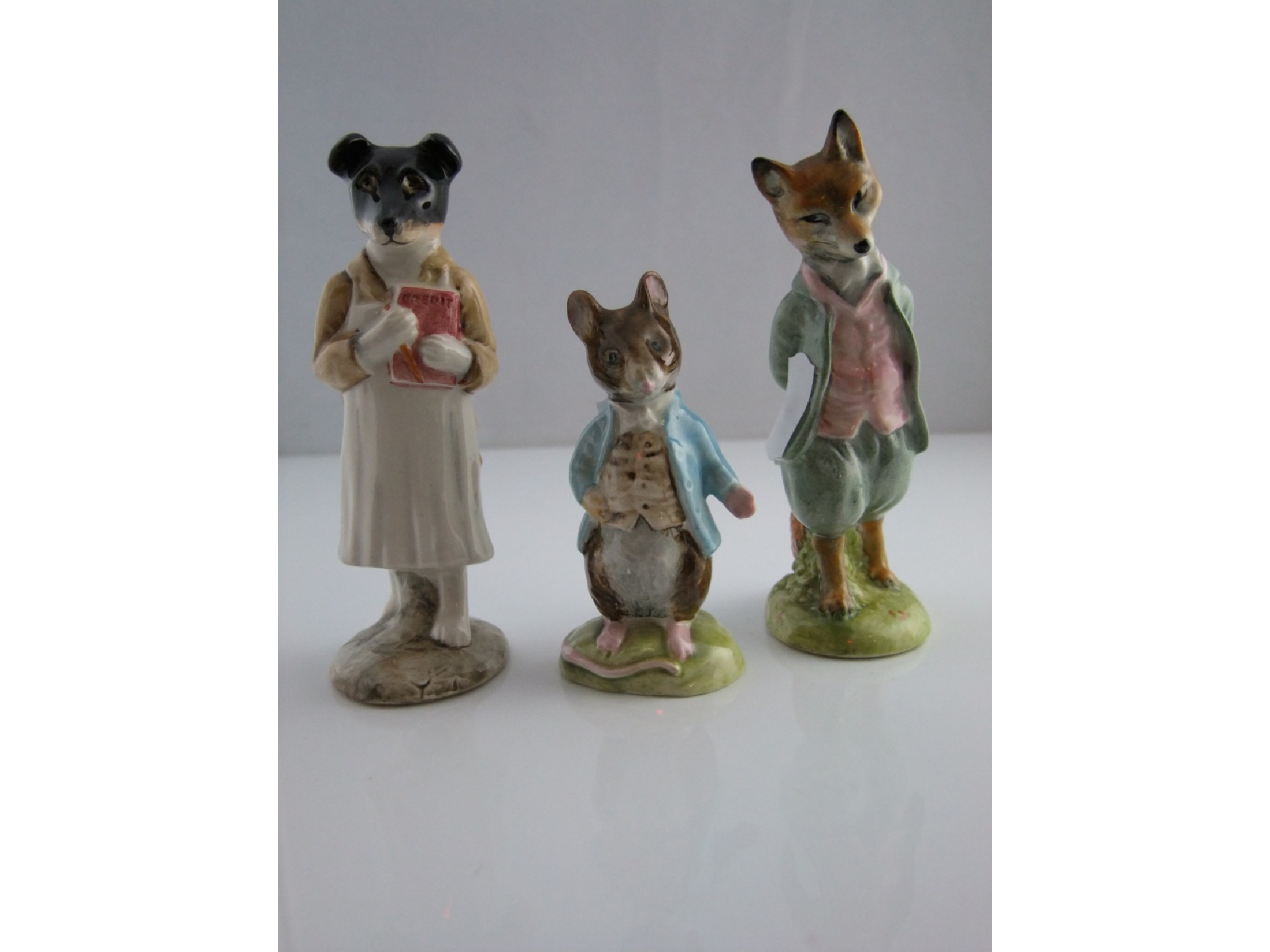 Appraisal: A collection of three Beswick Beatrix Potter figures Pickles Foxy