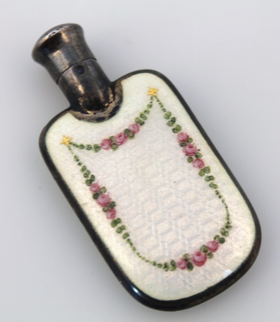 Appraisal: An early thC enamel and white perfume bottle the shouldered