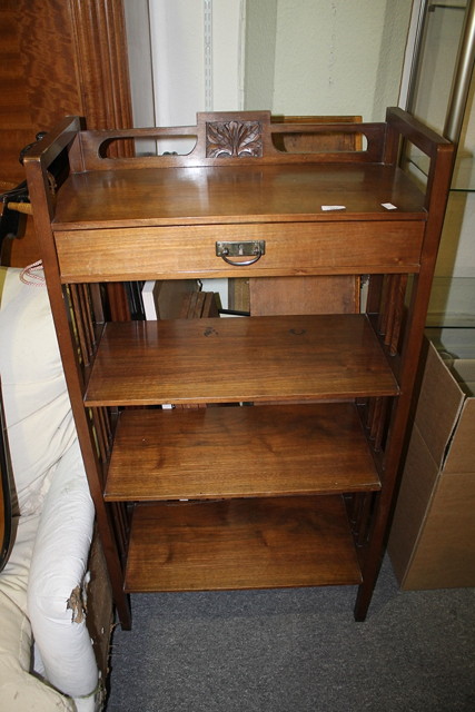 Appraisal: A VICTORIAN WALNUT WHATNOT with carved back fitted one drawer