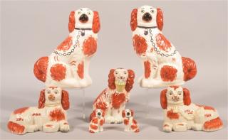 Appraisal: Authentic Reproduction Staffordshire Spaniels Authentic smallest pair Reproduction Staffordshire Spaniels