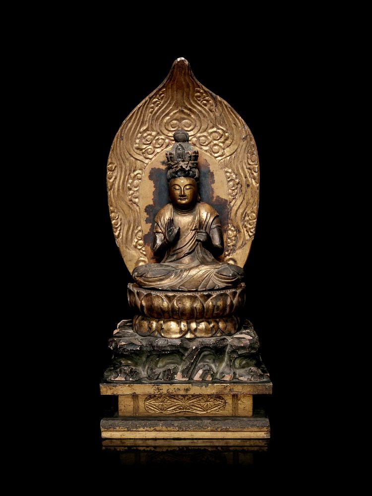 Appraisal: A Gilt Lacquered Wood Figure of Seated Kannan A Gilt