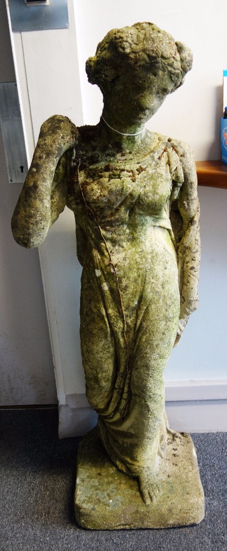 Appraisal: A reconstituted stone figure of a standing robed Greek female