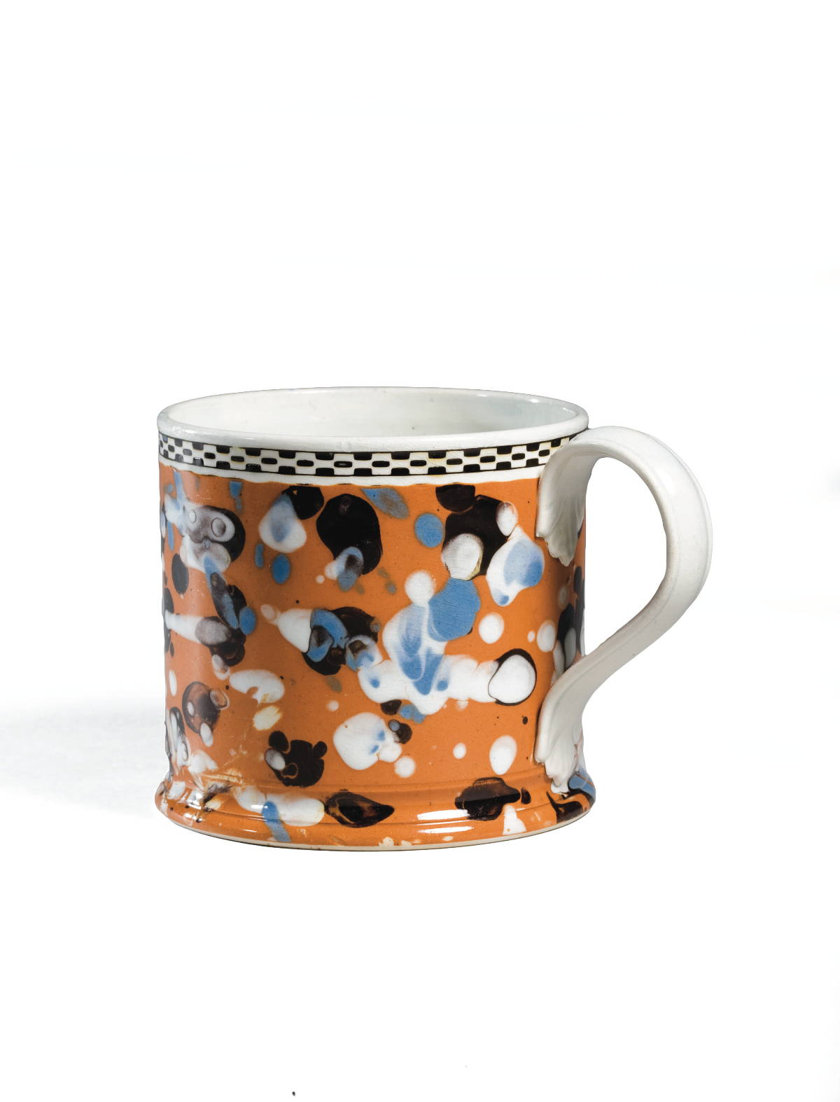 Appraisal: BRITISH PEARLWARE MOCHAWARE PORTER MUG CIRCA Slip-marbled in black slate