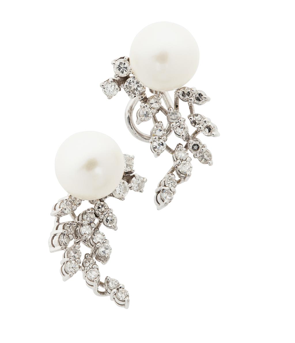 Appraisal: A pair of diamond and pearl earrings each set with